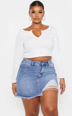 Plus Mid Wash One Sided Ripped Hem Denim Skirt